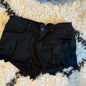 Black distressed jean shorts